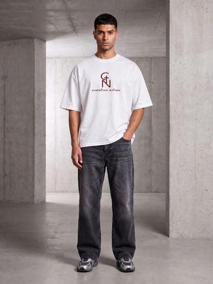 Christian Nation Banner T-Shirt in white, full-length outfit with grey jeans (image 2 of 2)